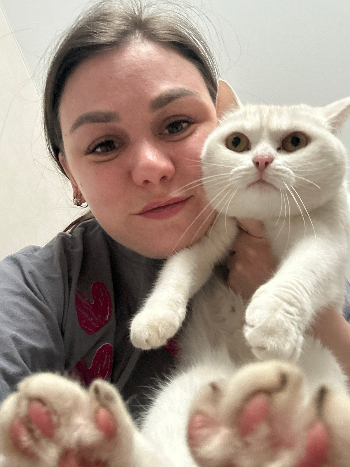 Family moments with toddler, baby, and cat captured in Chaikovsky