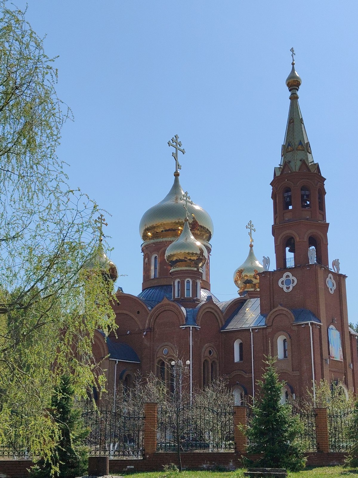 Orthodox Cathedral with Golden Domes Observed in Urban Setting