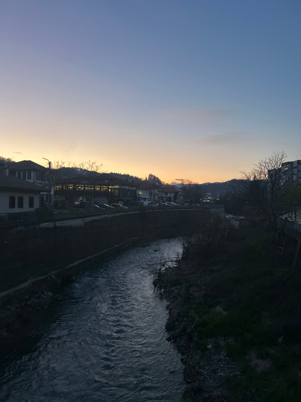 Evening drive documented through Zlatograd, Bulgaria streets at twilight