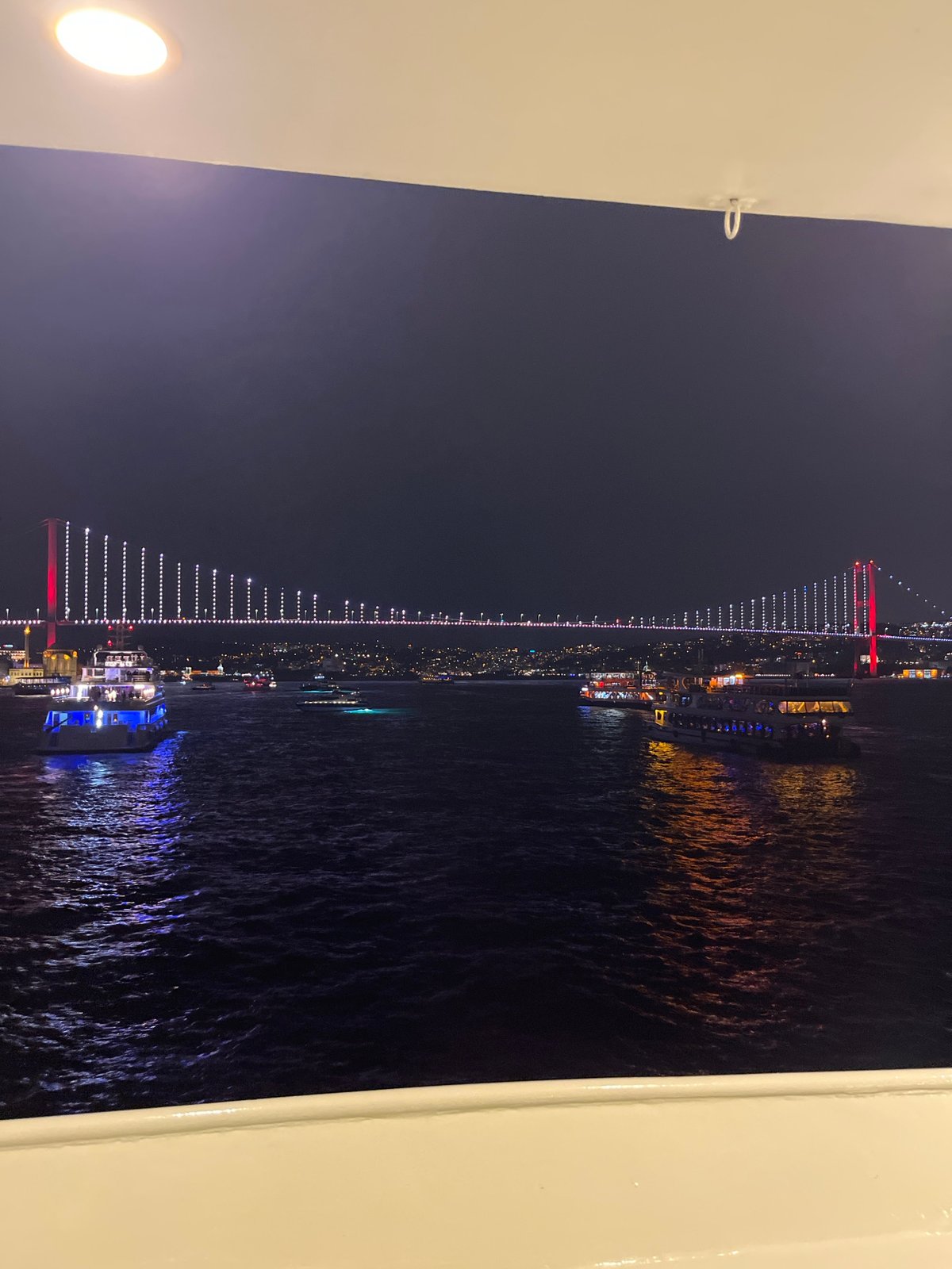 Nighttime bridge illumination captured in Üsküdar, Turkey
