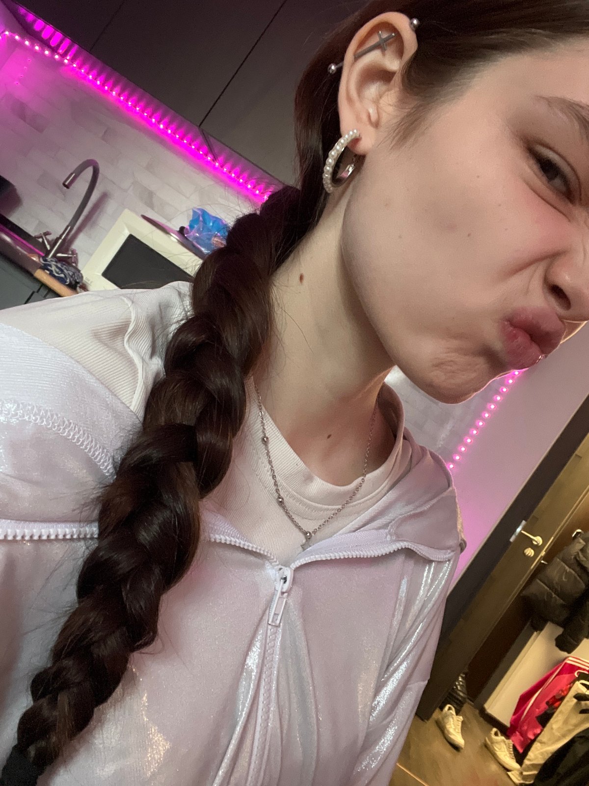 Person takes playful selfies in Saint Petersburg elevator