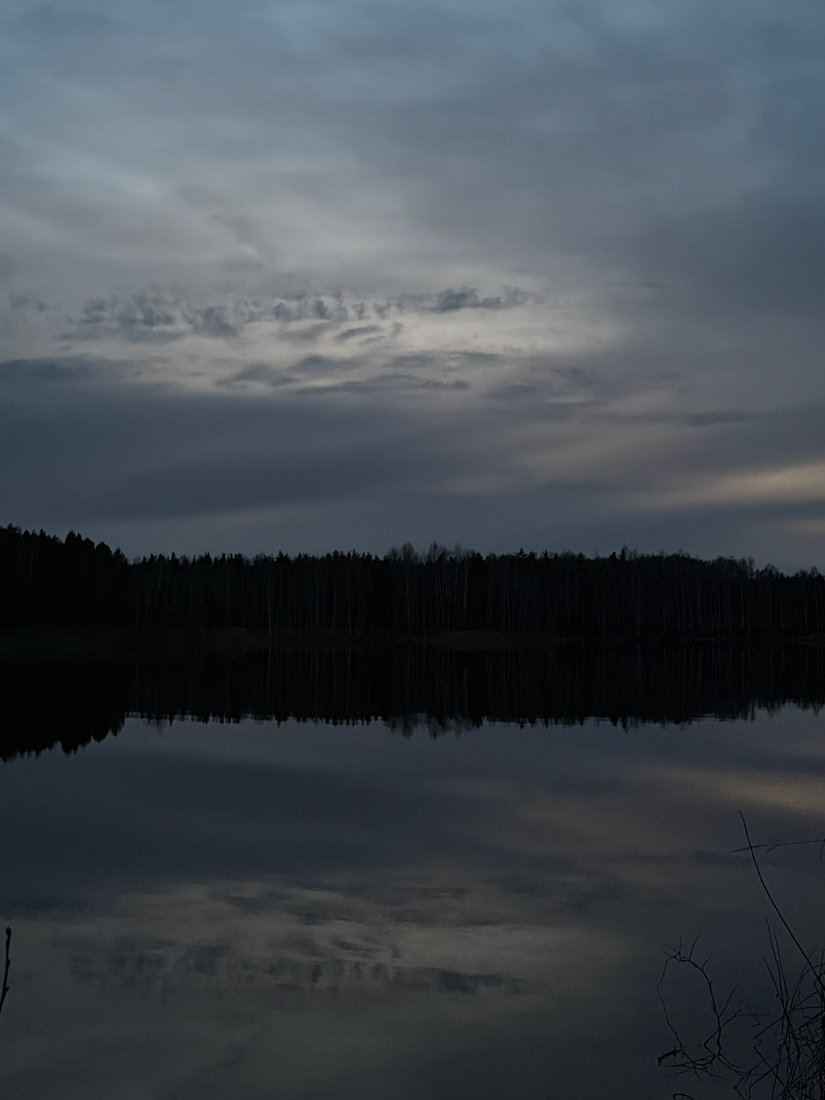 Serene twilight waterscape photographed in Novyi, Russia