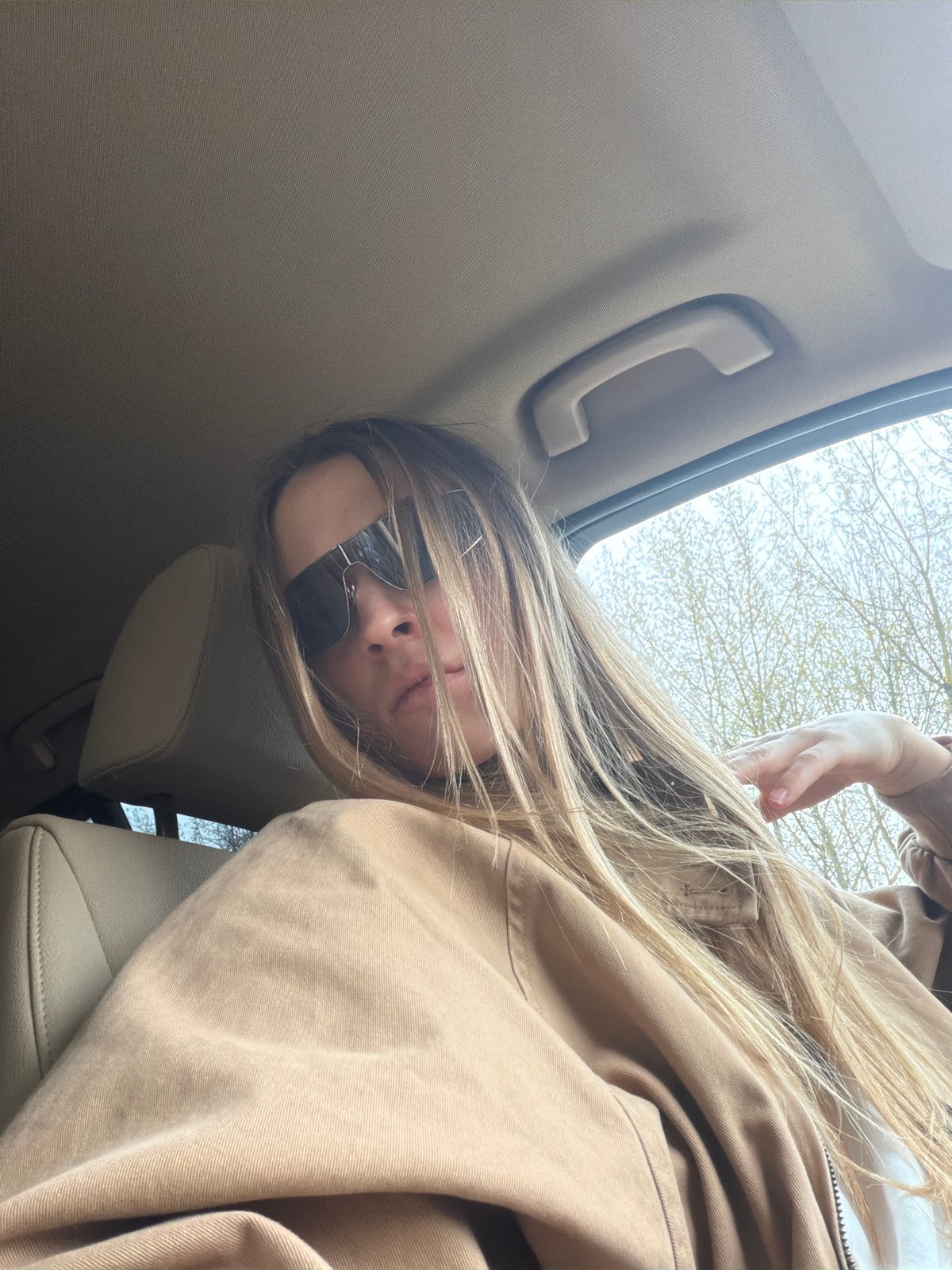 Person photographed resting inside vehicle in Moscow