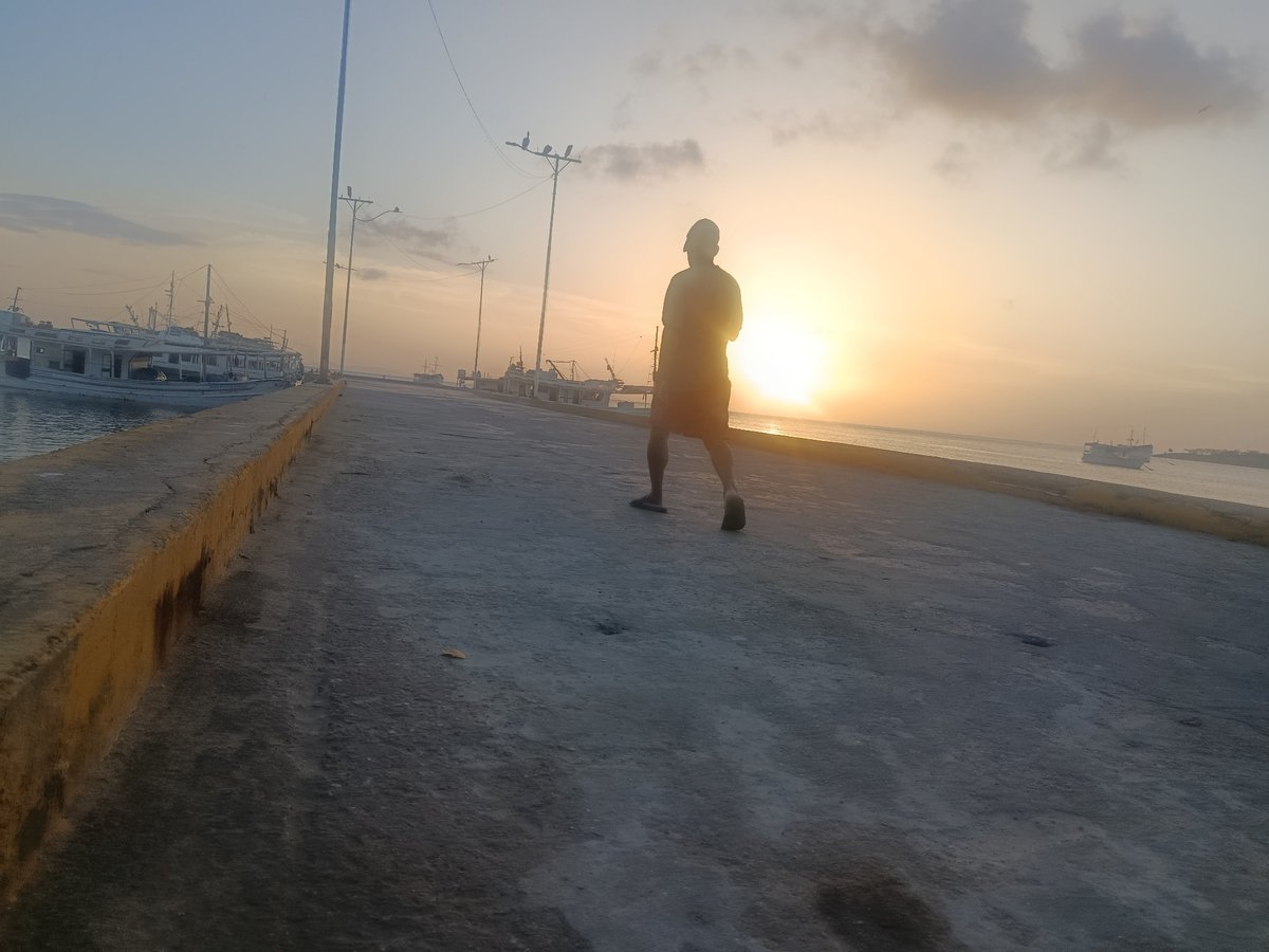 Evening sunset documented at Juan Griego fishing pier, Venezuela