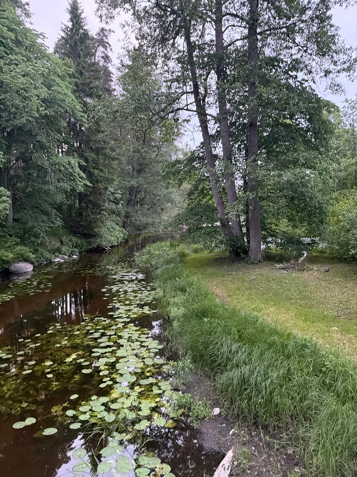 Visitors document Estonia's Keila-Joa waterfall and historic manor complex