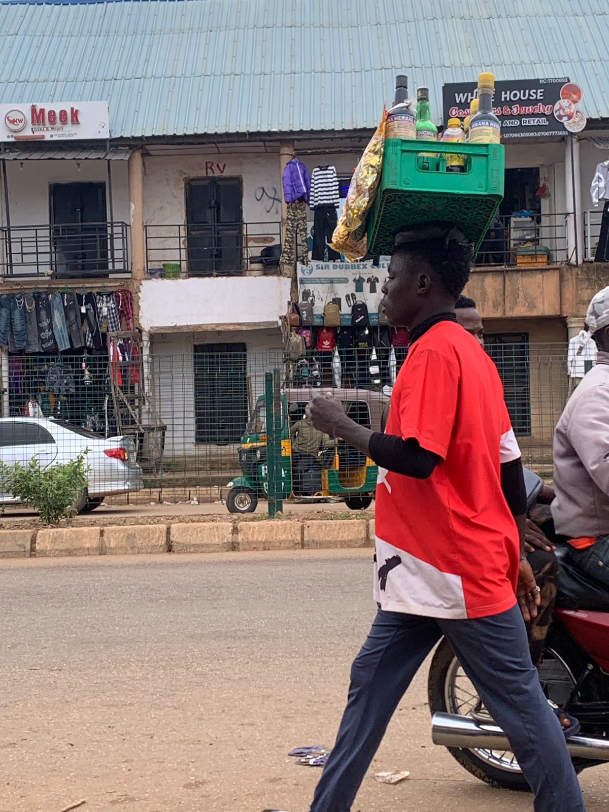 Street life and trade moving through Bukuru, Nigeria