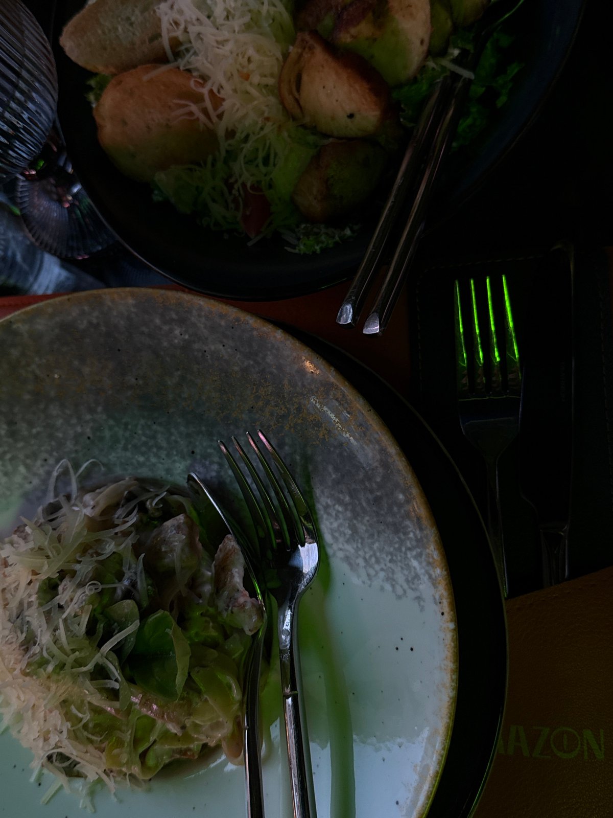 Diner enjoys pasta and salad at Yerevan restaurant