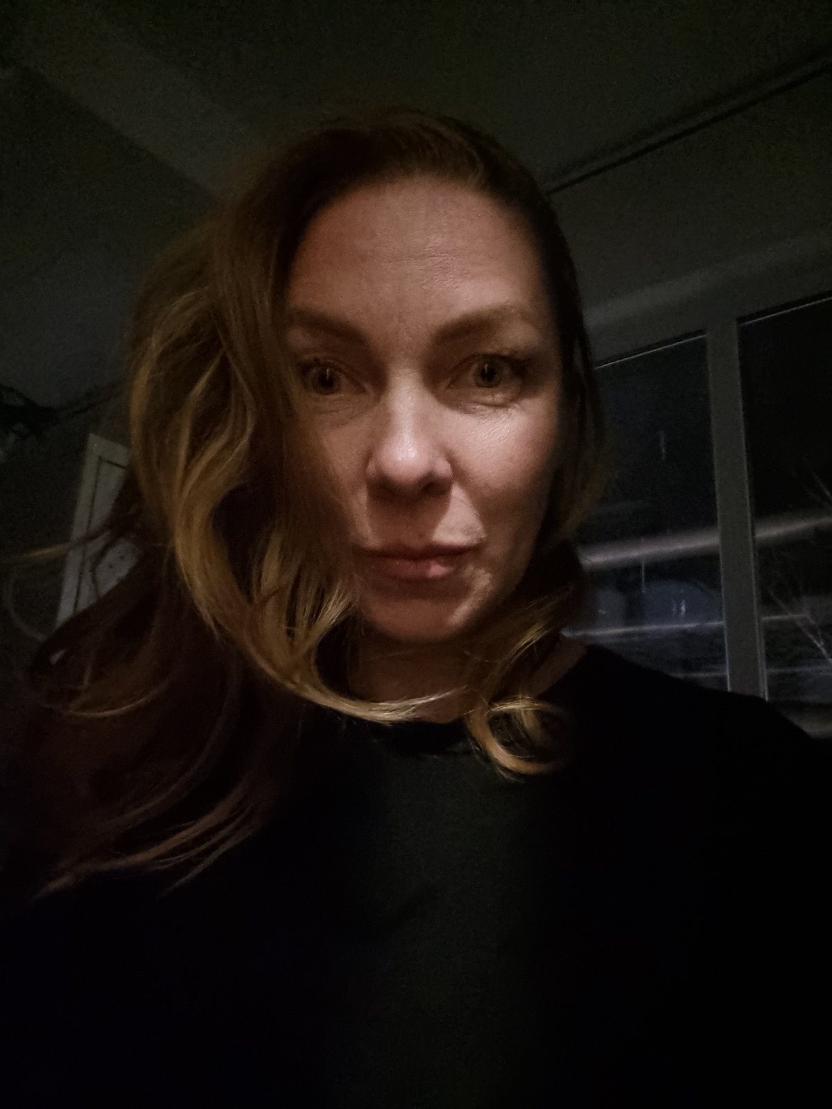 Woman photographed in casual indoor session in Kemul, Russia