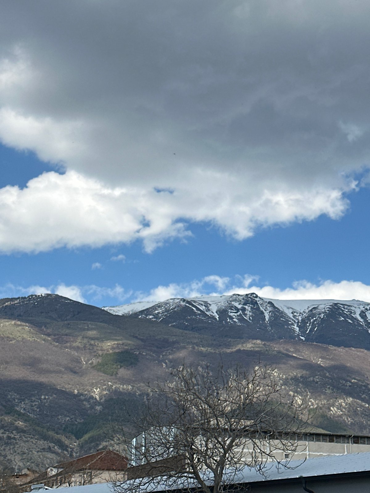 Mountain landscape with snow-capped peaks observed near Karlovo, Bulgaria