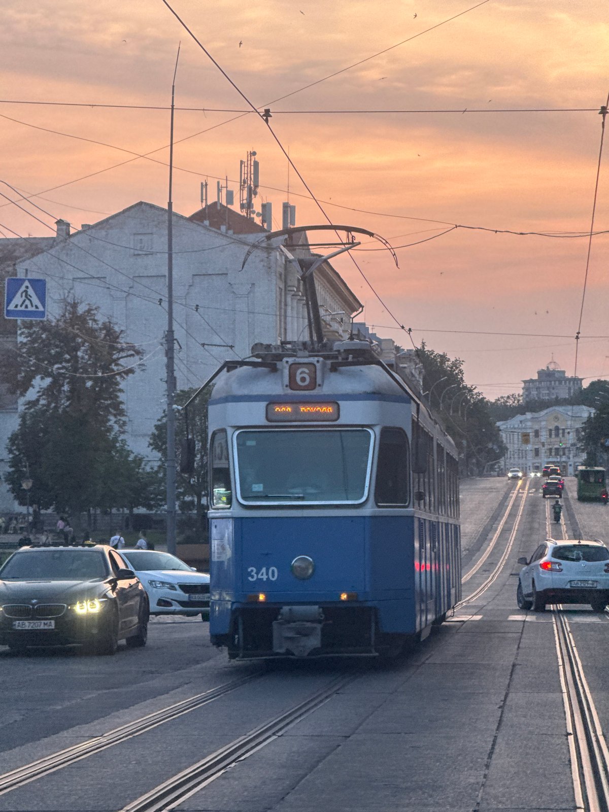 Tram and cathedral at golden hour in Vinnytsia