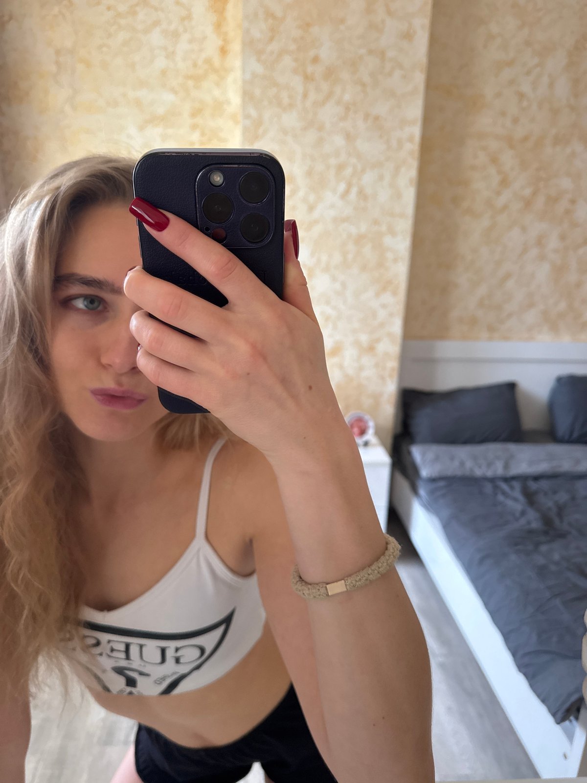 Woman documents daily life through selfies and casual moments
