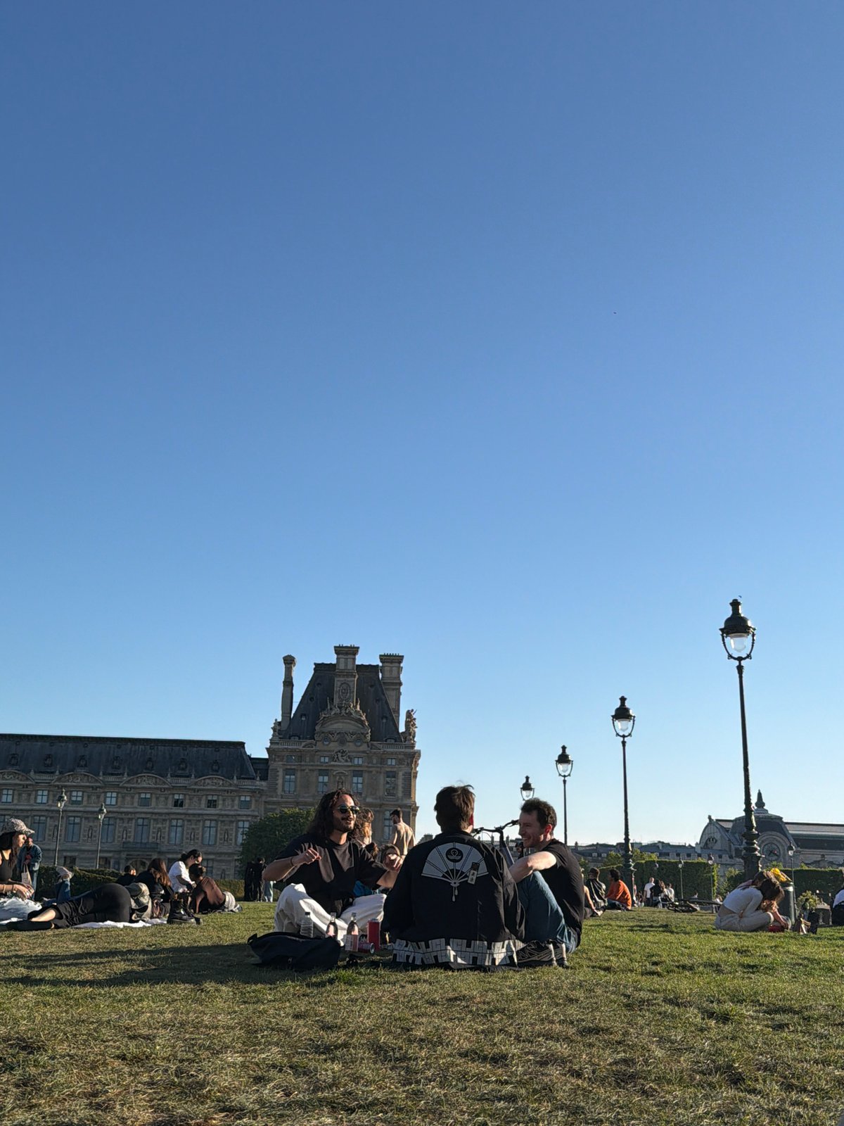 Parisians enjoy clear spring afternoon in public park