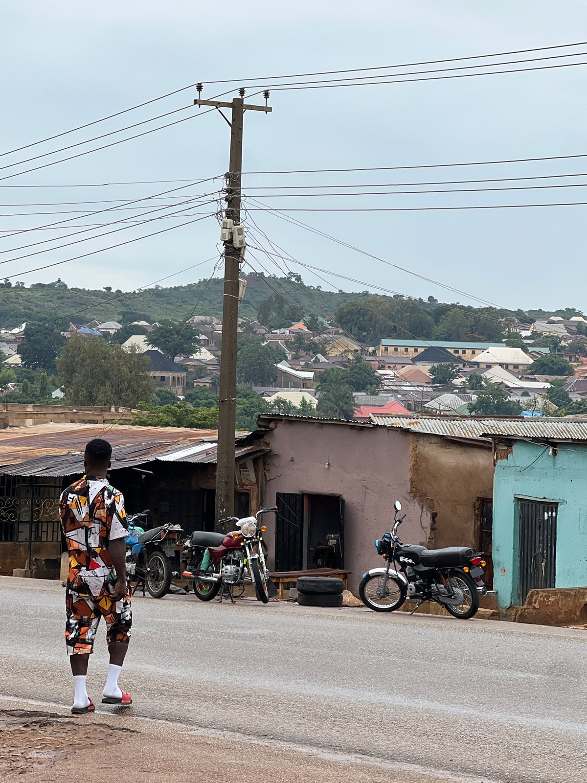 Daily life documented across Jos, Nigeria during rainy morning