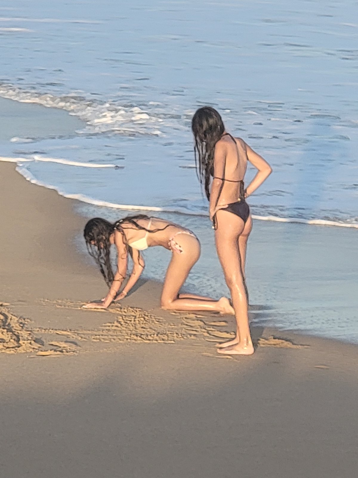 Golden hour at Quarteira beach, wading and unwinding by the Atlantic