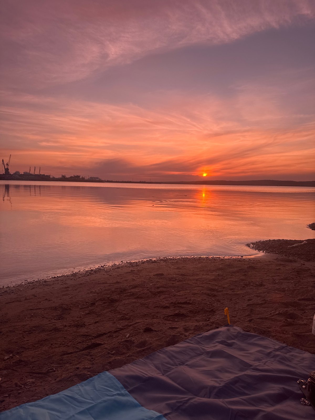 Sunset witnessed over water in Chaikovsky, Russia