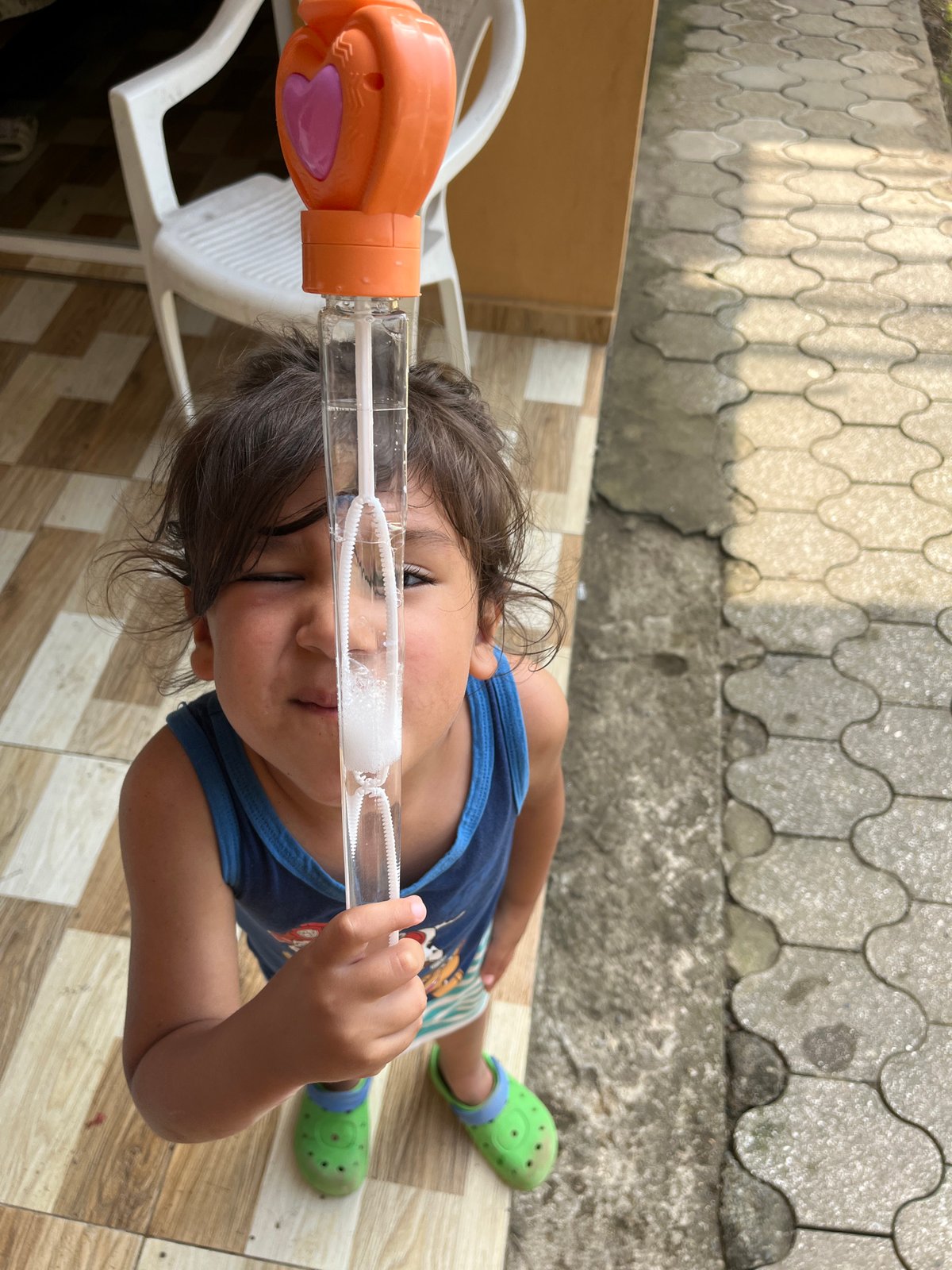 Bubble-blowing on a sunny patio in Kobuleti, Georgia