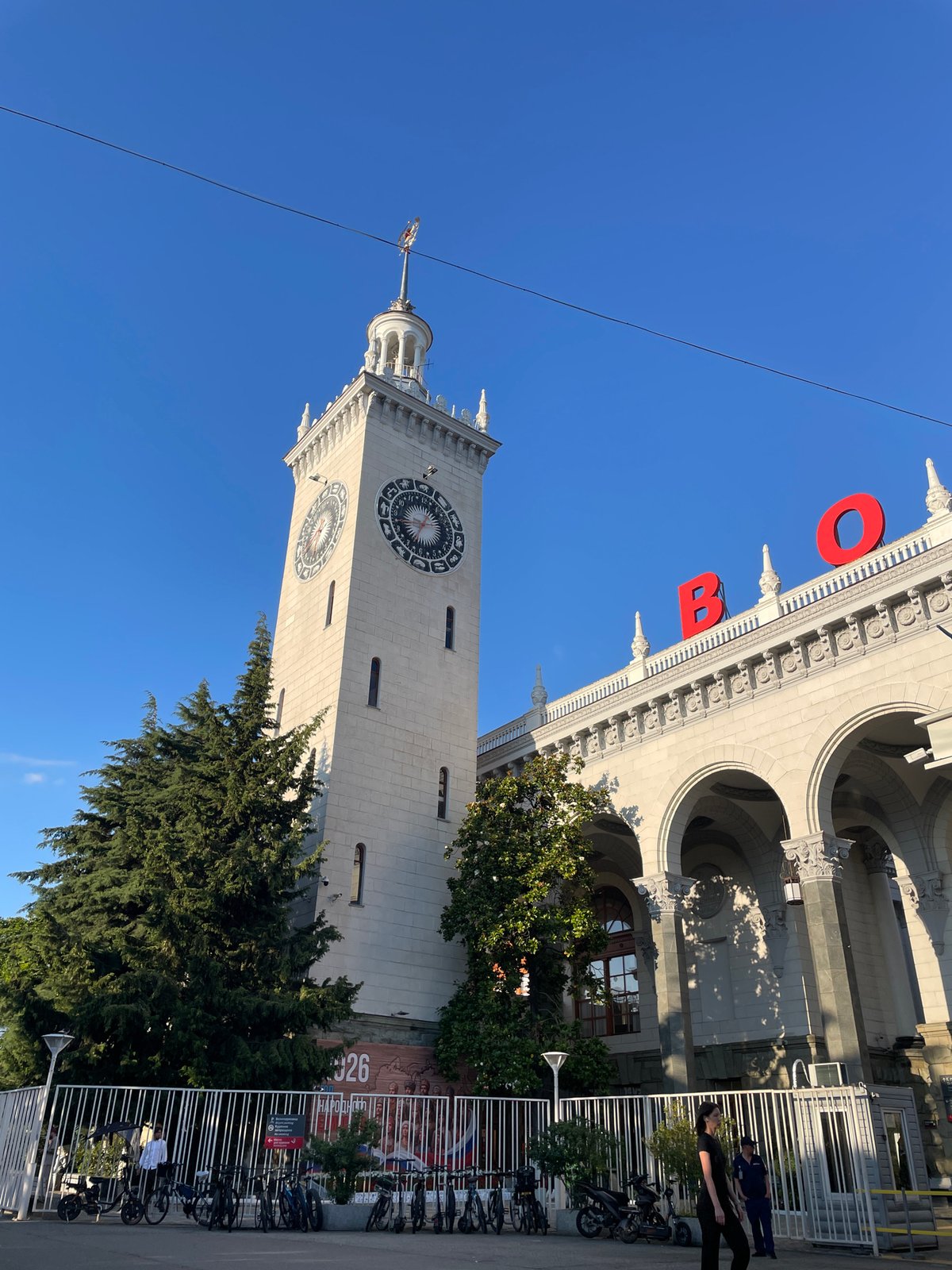 Sochi city center on a sunny afternoon — landmarks, palms, port