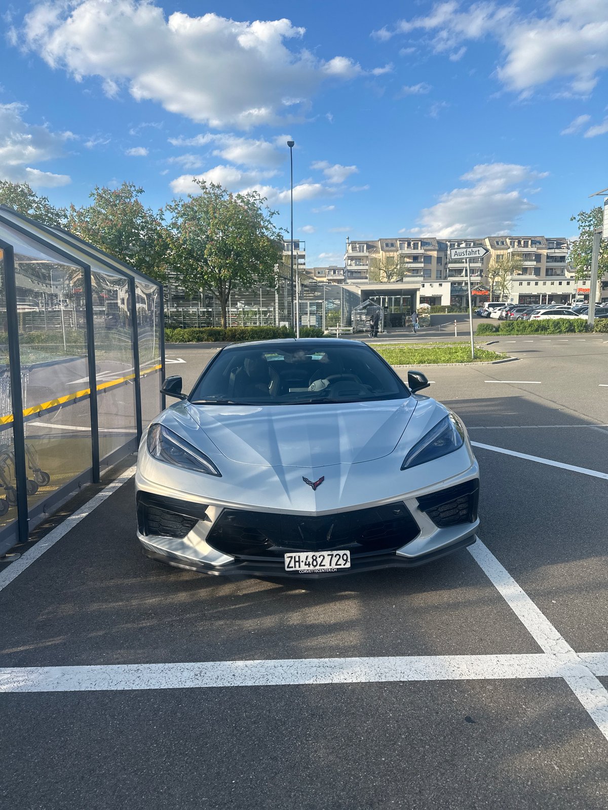 Corvette C8 photographed from multiple angles in Swiss parking lot