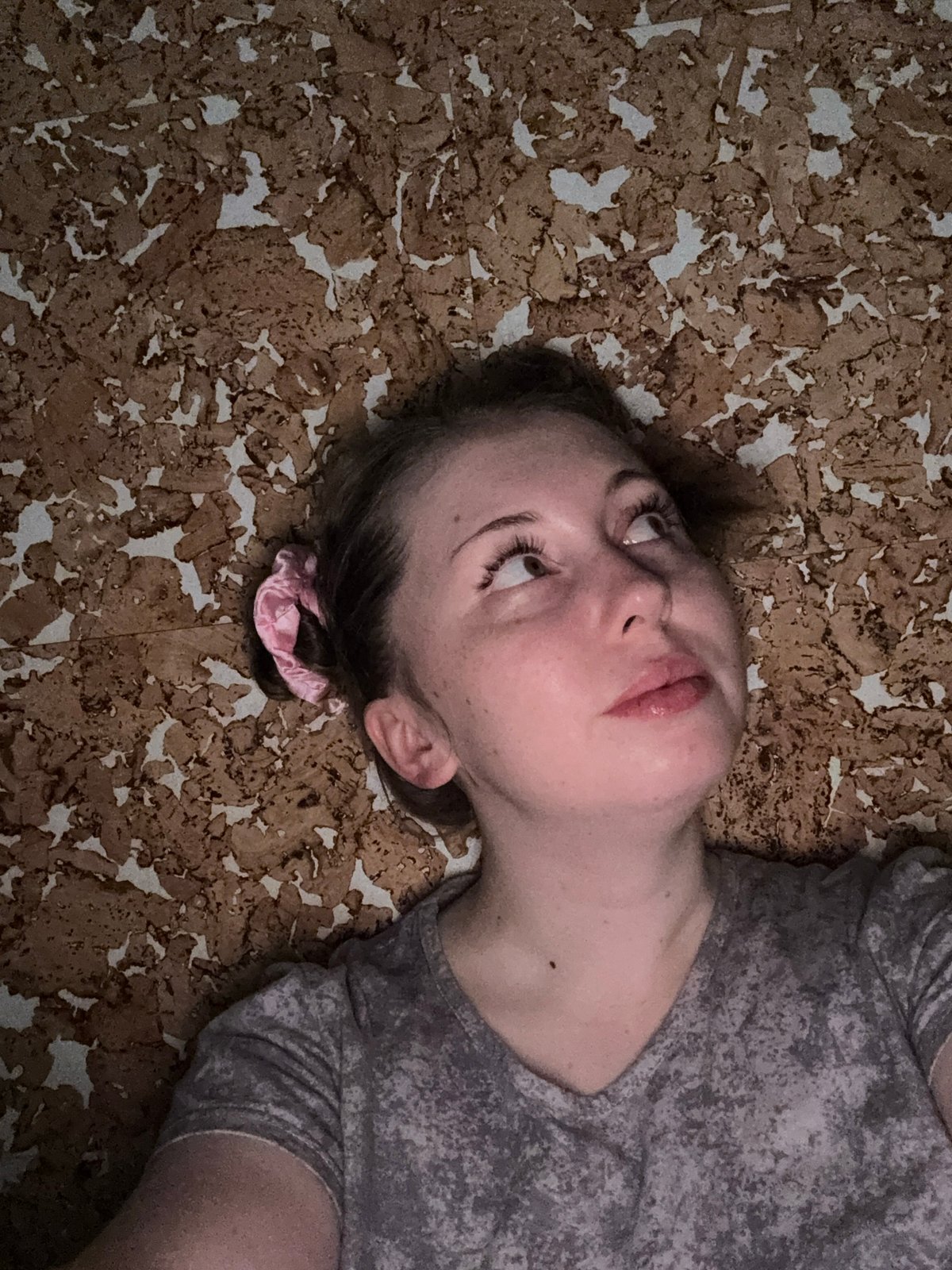 Woman documents personal self-care routine in unknown location