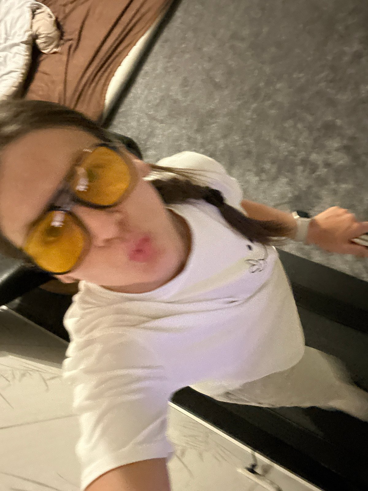 Woman takes indoor selfies in Fredenbeck, Germany