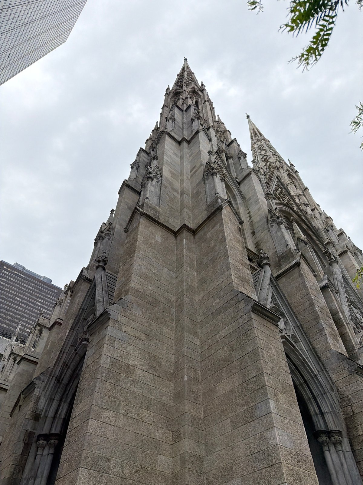 Manhattan street walk captures cathedral, art displays, religious procession