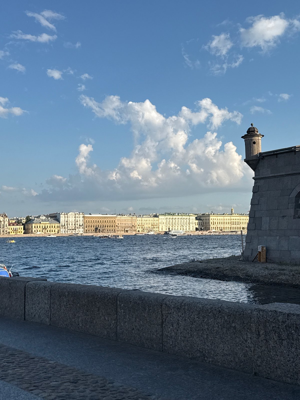 Stone embankment and skyline along the Neva River