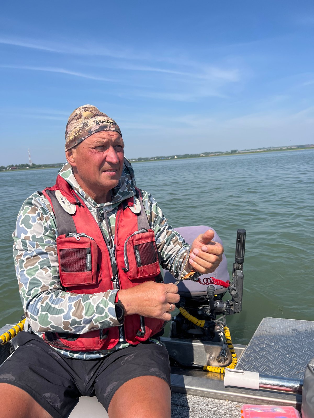 Out on the water near Novopichugovo in full fishing kit