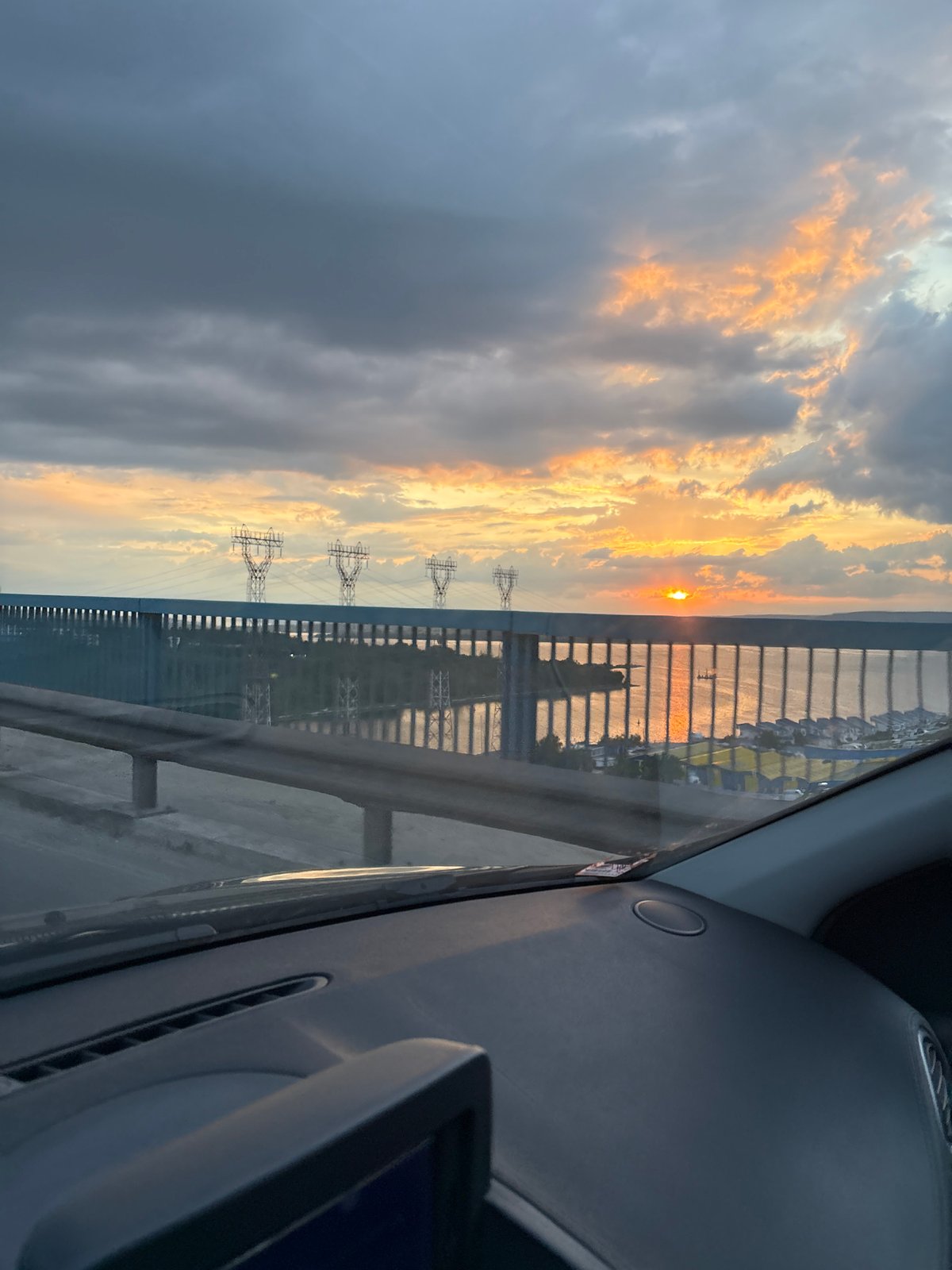 Sunset captured from vehicle crossing bridge in Varna, Bulgaria