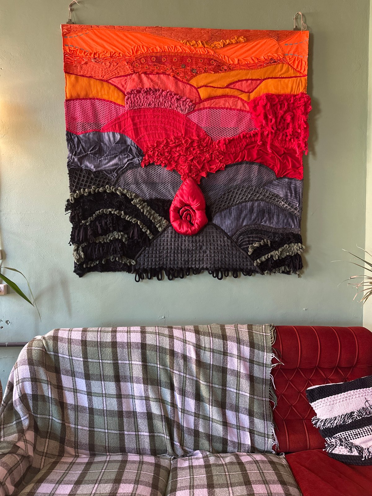 Gradient fabric artwork displayed on wall in Kryvyi Rih