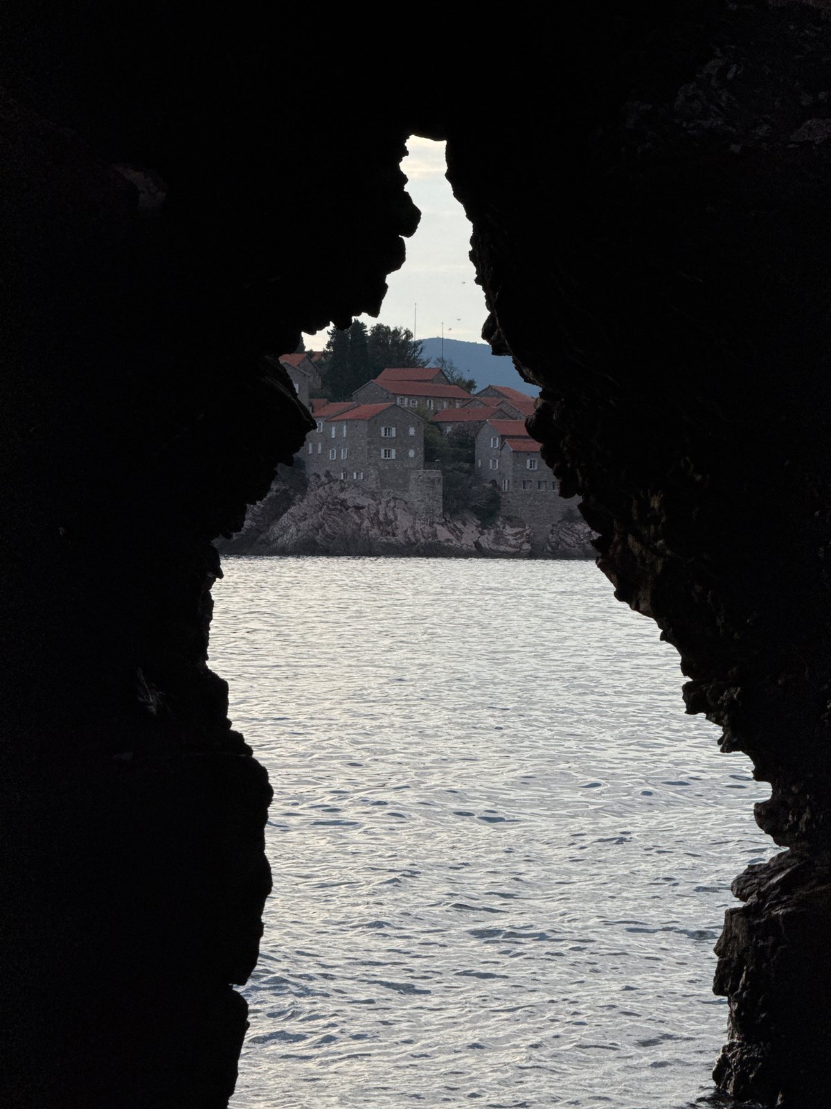 Inside a coastal cave at Sveti Stefan, looking out to sea