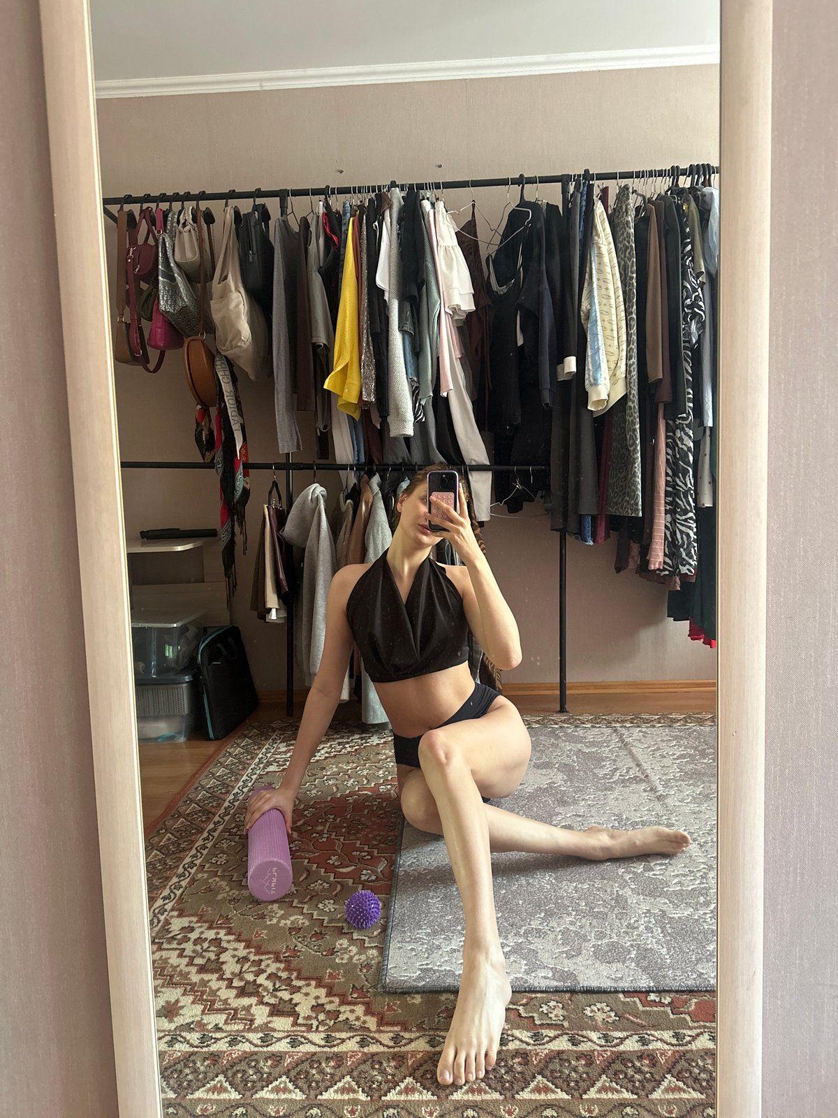 Morning foam rolling exercise session documented in Krasnoyarsk residence