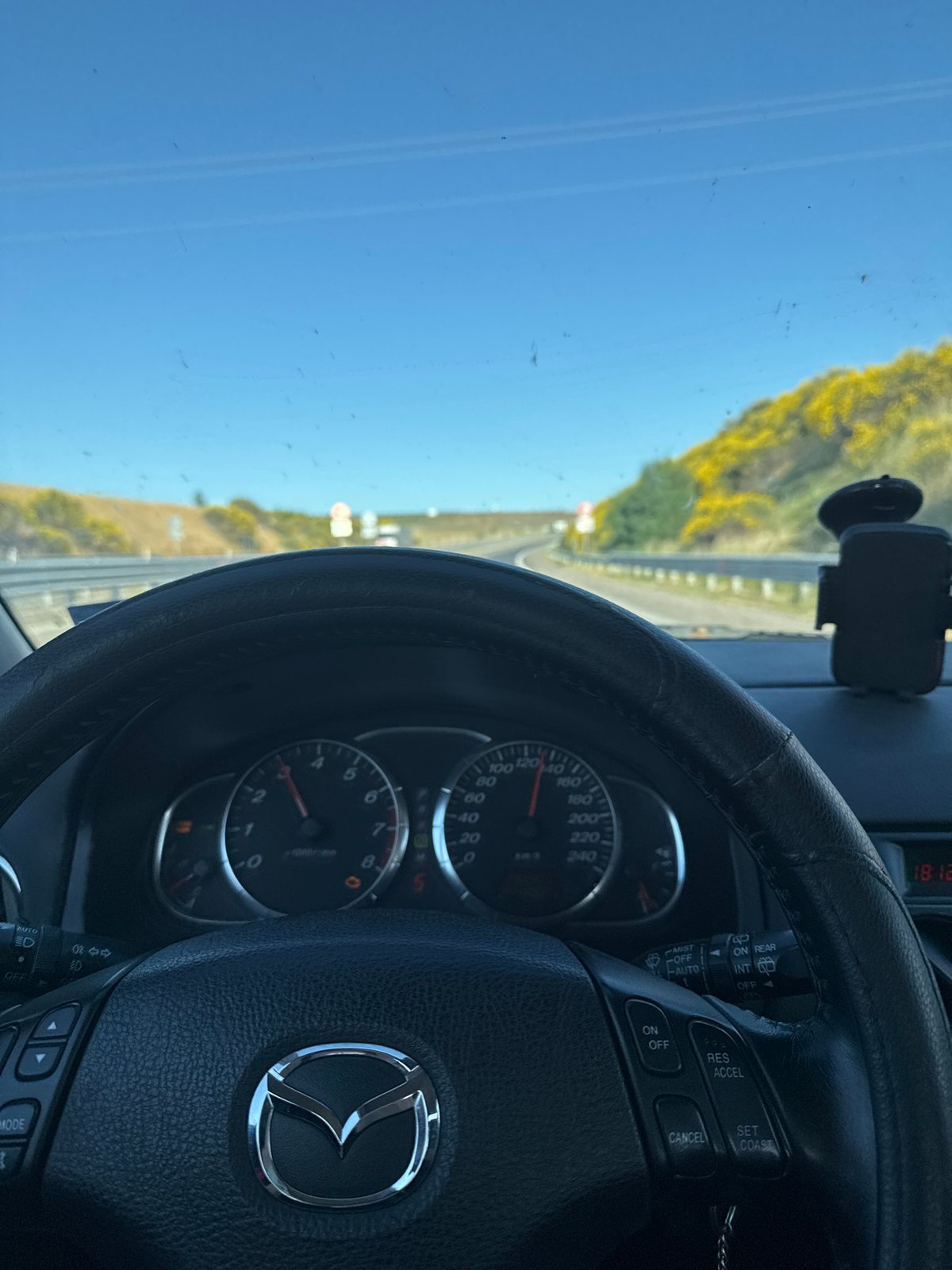 Driver's perspective captured inside Mazda vehicle in Vratitsa, Bulgaria