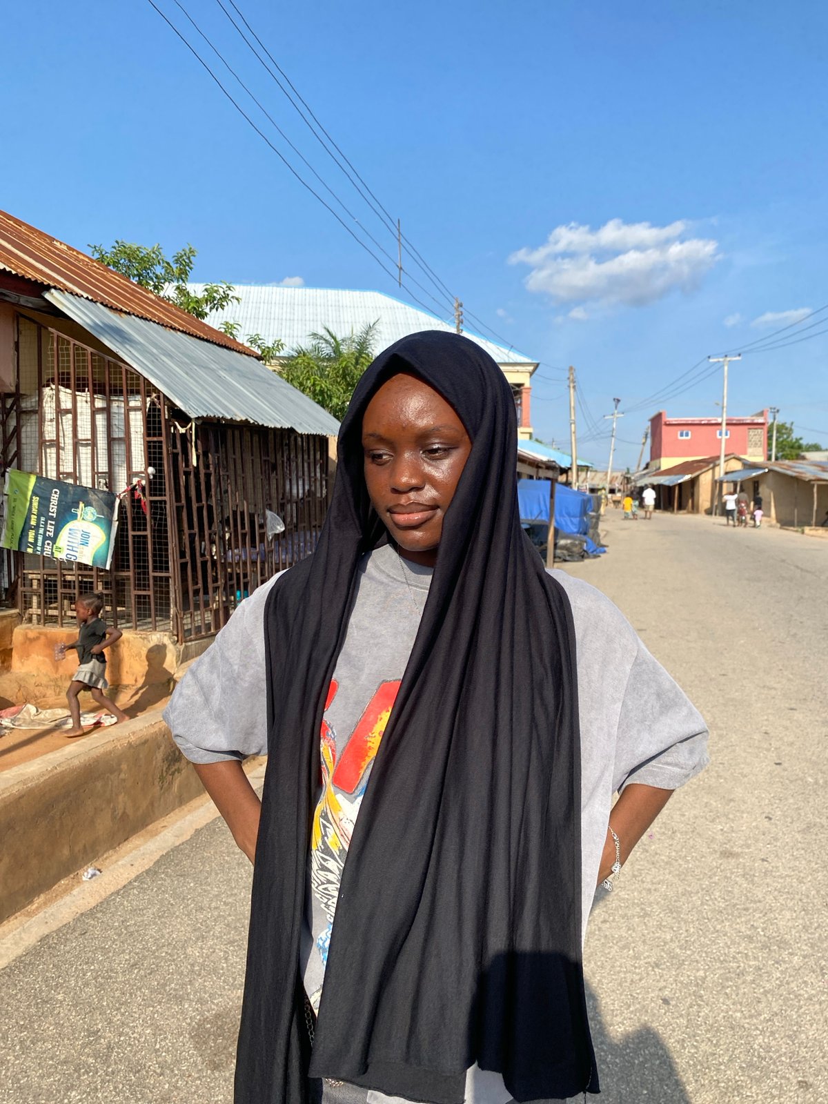 Afternoon street life along a busy road in Jalingo, Nigeria