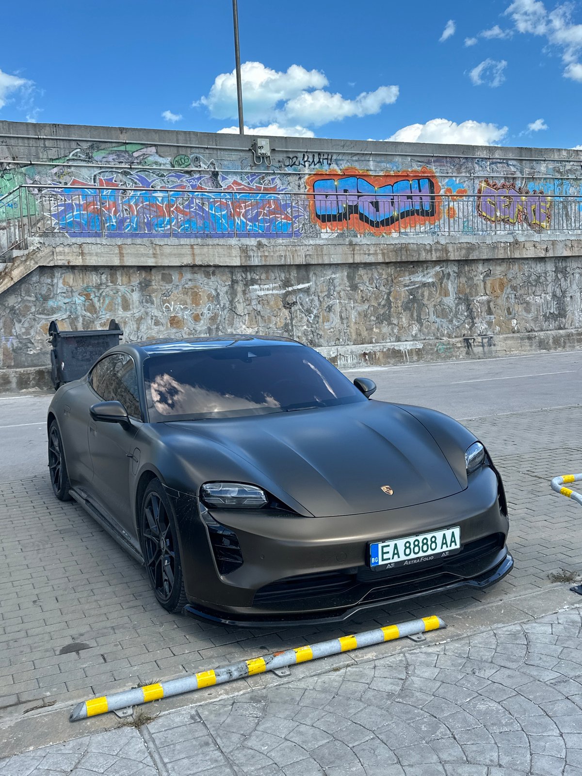 Porsche spotted at Varna marina amid docked sailboats