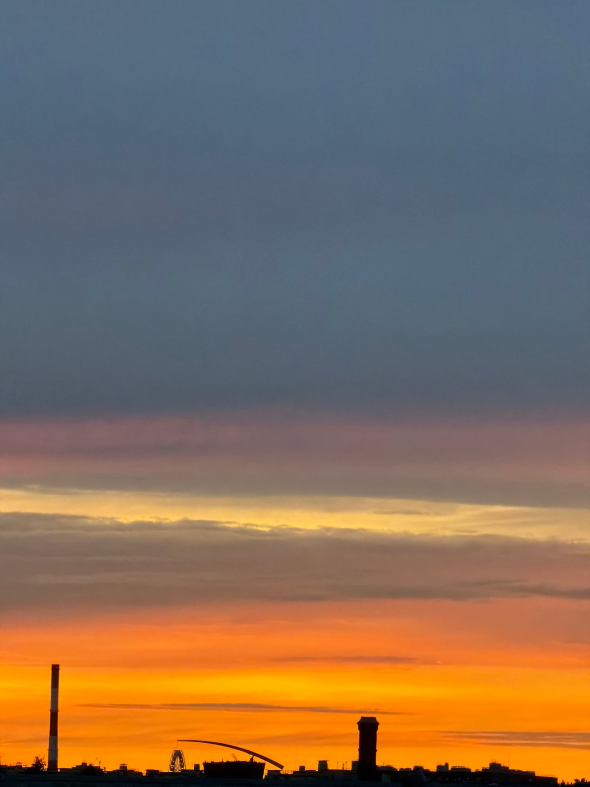 Sunset over Saint Petersburg from the river and above