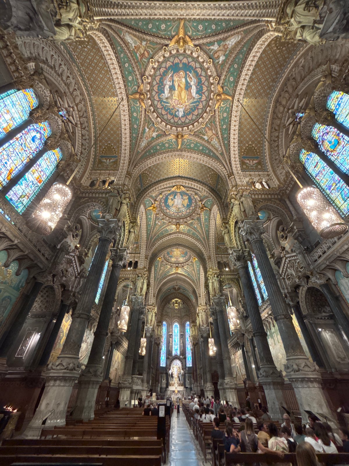 Visitor documents Lyon's Notre-Dame de Fourvière Basilica and historic staircase
