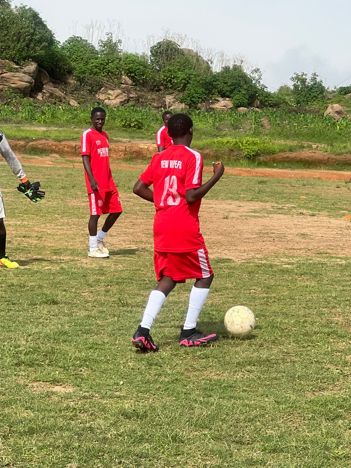 New Hope FC trains on a Jos pitch on a July morning