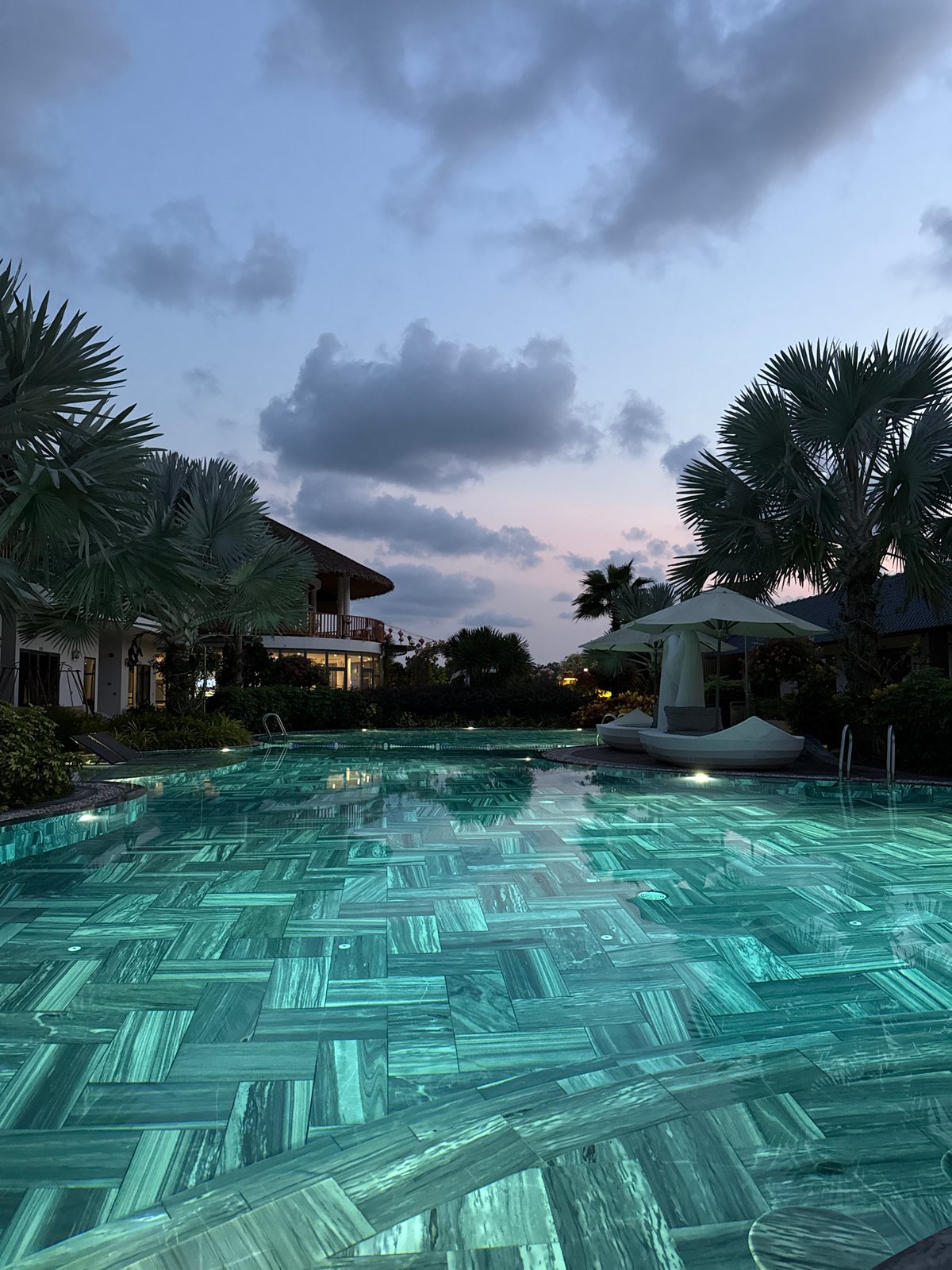 Resort pool captured at twilight in Phú Quốc Vietnam