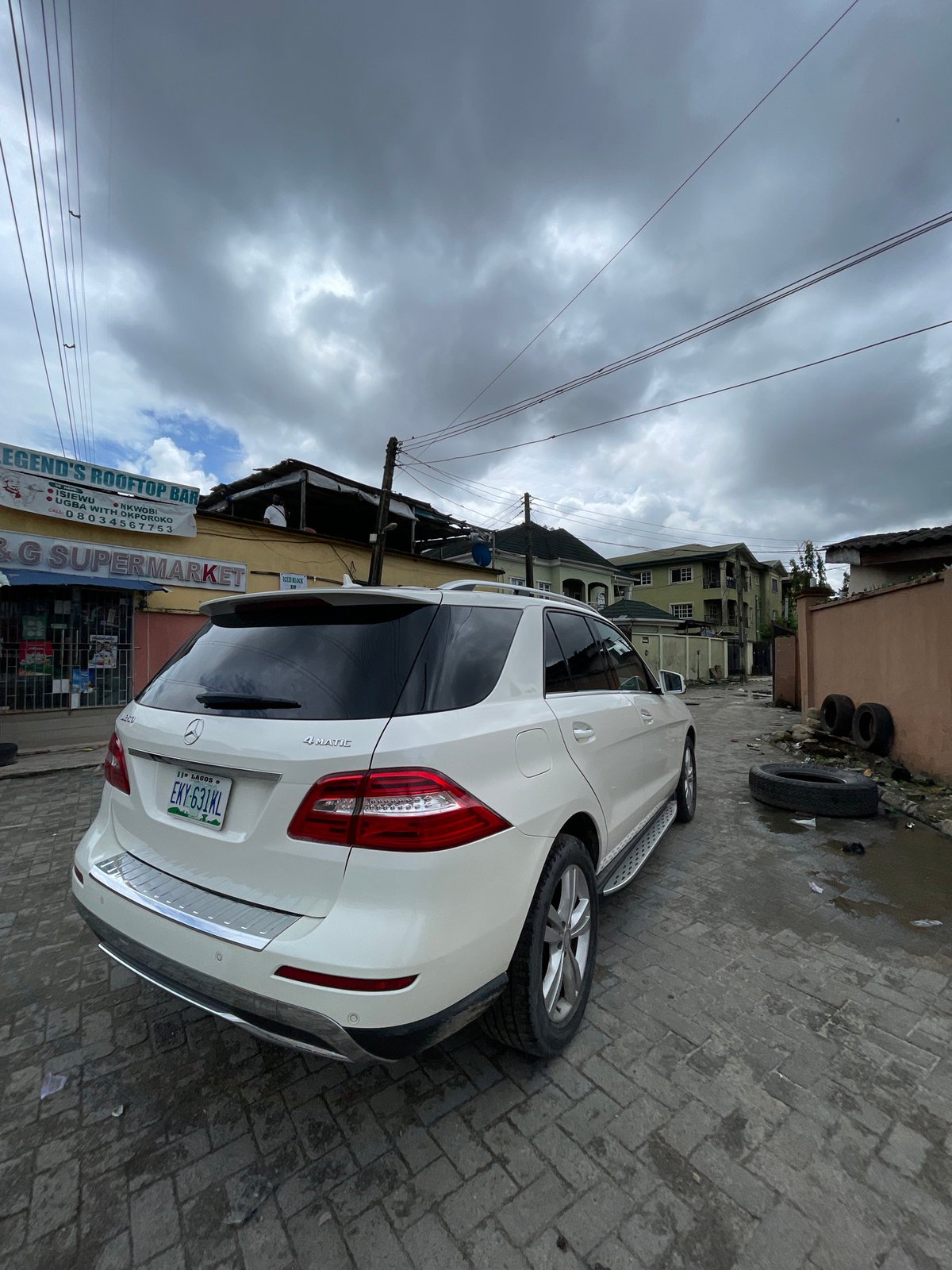 Morning street and market activity across Ado, Nigeria
