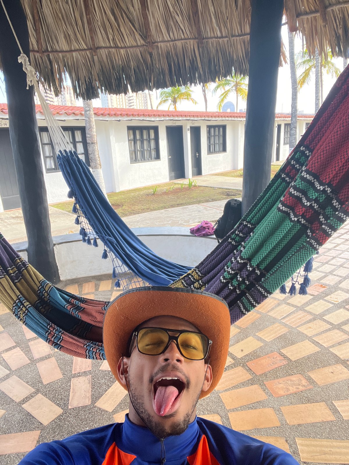 Tourist documents poolside vacation moments in Porlamar resort area