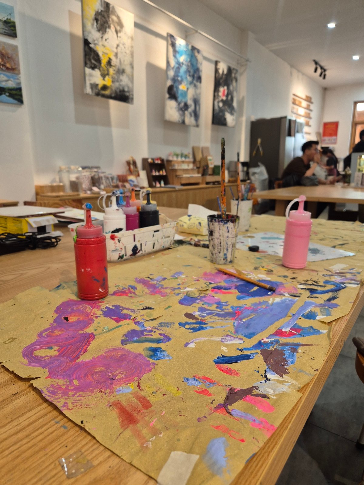 Art studio in Đà Nẵng with tropical beach painting in progress
