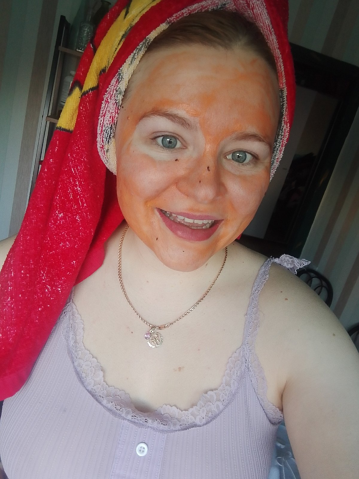 Woman takes selfies during skincare routine in Izhevsk, Russia