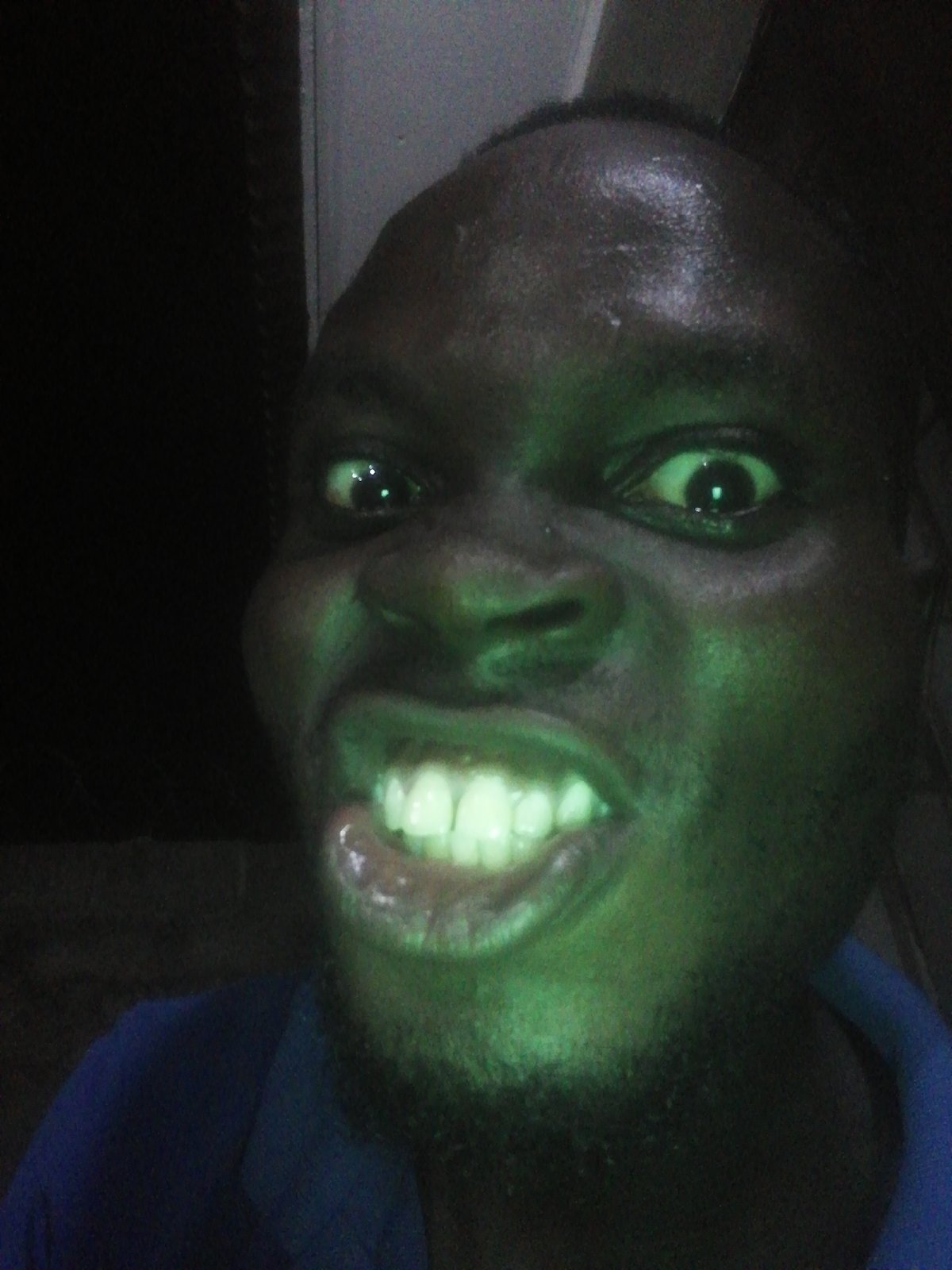 Man takes playful selfie session in Ikorodu, Nigeria