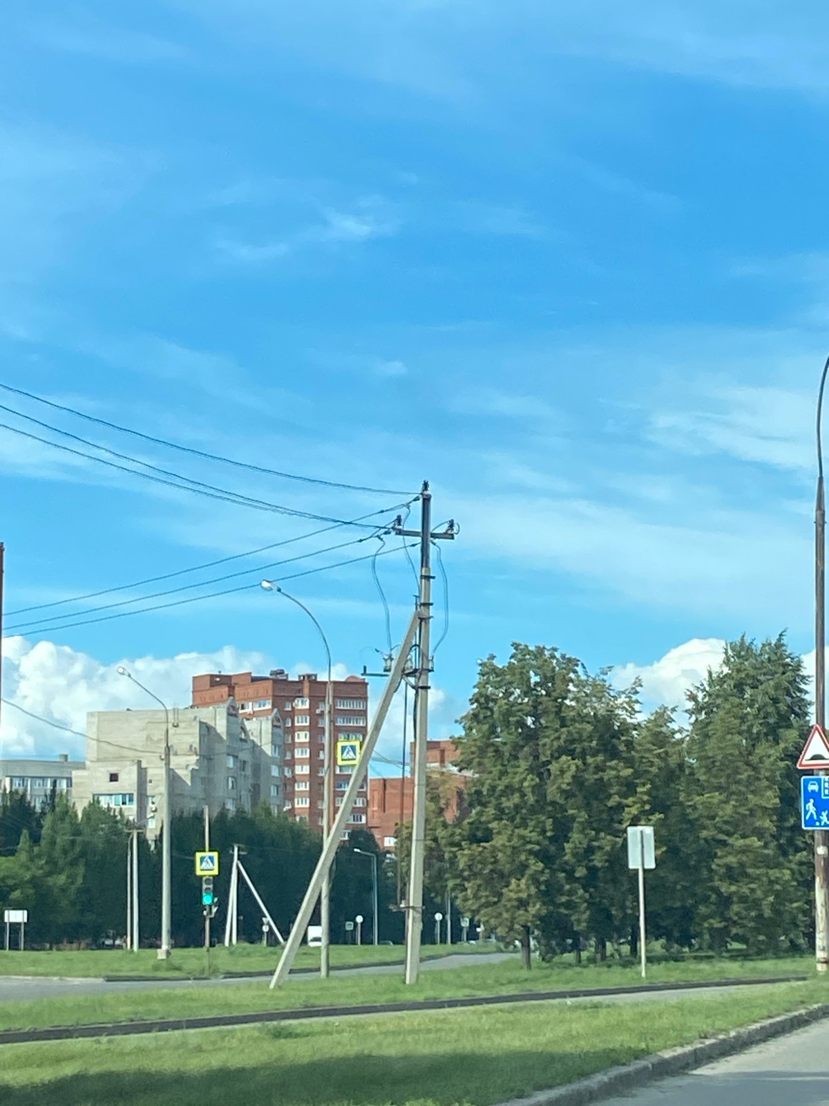 Driving through Tolyatti's residential streets on a sunny afternoon