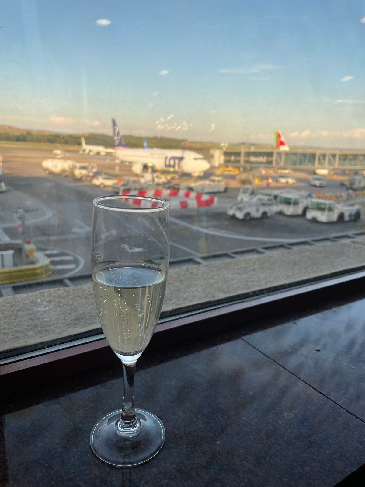 Champagne toast view overlooking Madrid Barajas Airport