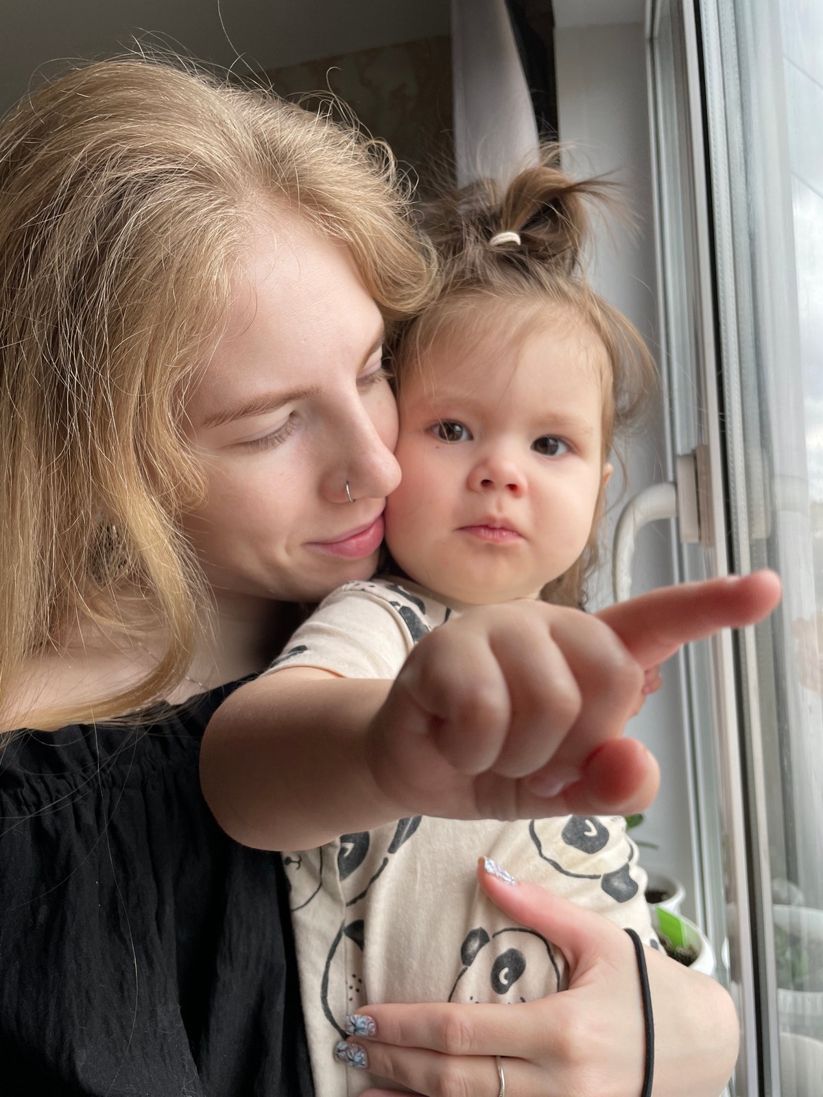 Mother and child photographed together in Izhevsk home