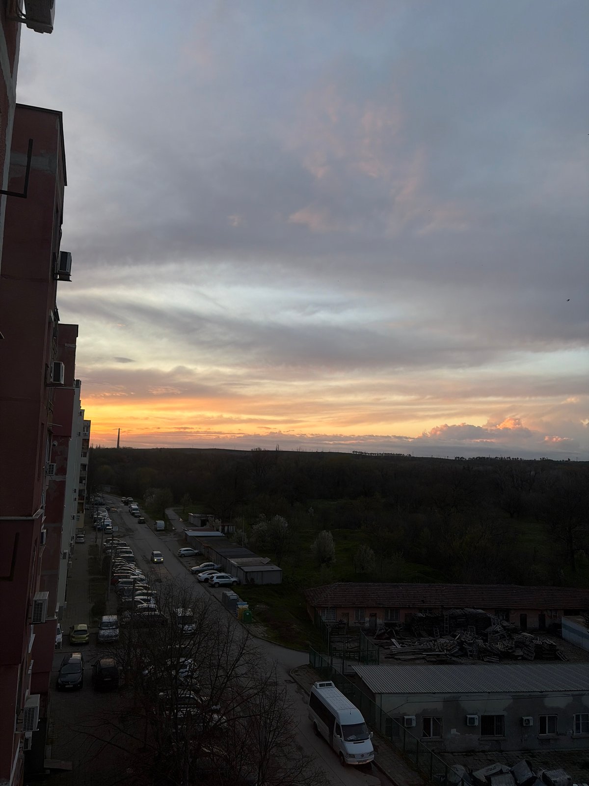 Sunset colors illuminate Dimitrovgrad, Bulgaria cityscape at dusk
