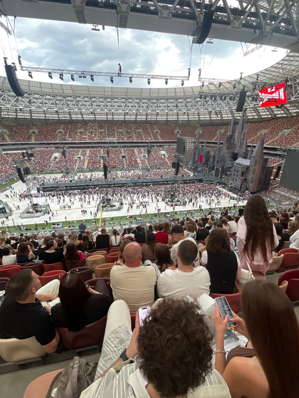 Packed Luzhniki Stadium hosts a massive concert with medieval castle stage