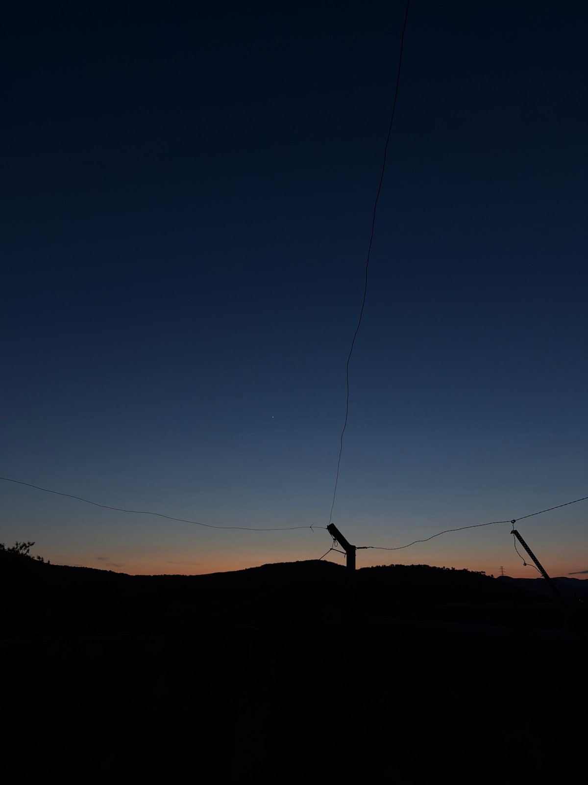 Evening documentation captures twilight, moon, dog in Sant Martí Sarroca