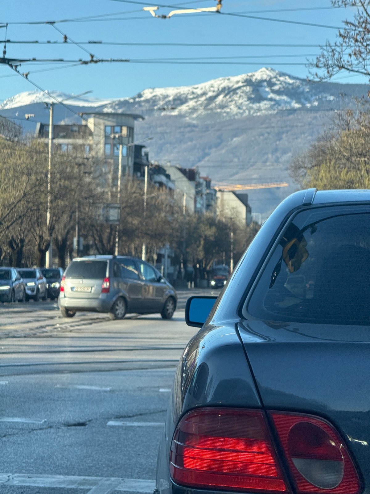 Morning traffic observation on tram-lined Sofia street